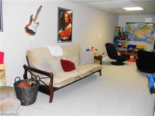 123 Hagen Road Advance, NC 27006 - Photo 12 of 16 Playroom. This room is used as the playroom. However it would also make an excellent office or work out space. There are also unfinished areas in the basement that are used for storage.