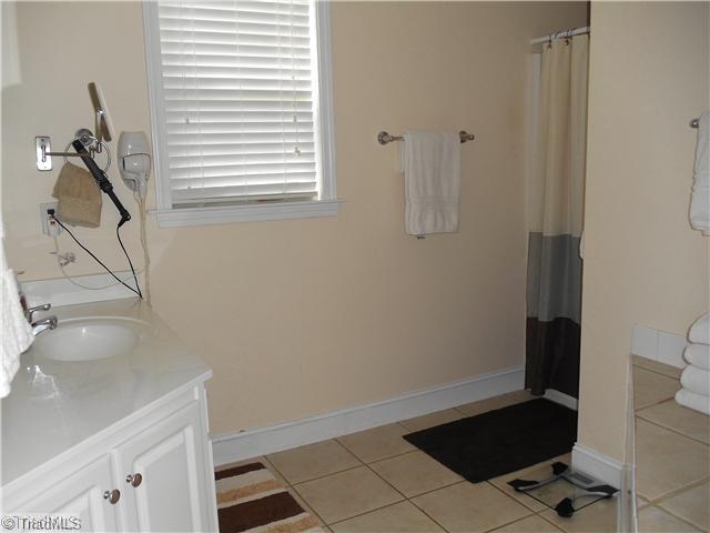 123 Hagen Road Advance, NC 27006 - Photo 14 of 16 Master Bath/Spa. The Master Bath features a Separate Shower, Ceramic Tiles and Jetted Tub.