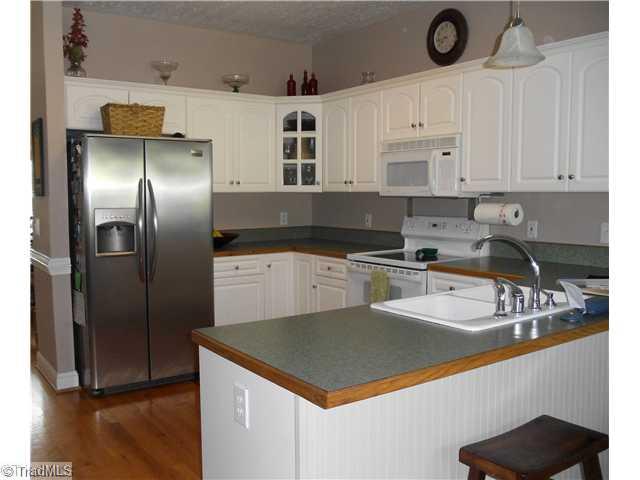 123 Hagen Road Advance, NC 27006 - Photo 4 of 16 Kitchen. Large kitchen with lots of cabinet space and hardwood floors.