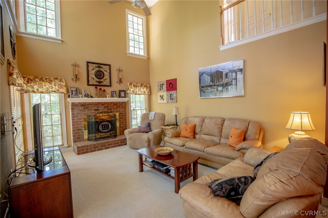 13340 Carters Way Road Chesterfield, VA 23838 - Photo 11 of 44 a living room with furniture and a fireplace