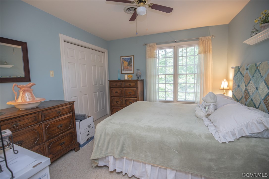 13340 Carters Way Road Chesterfield, VA 23838 - Photo 23 of 44 a bedroom with a bed window and a ceiling fan