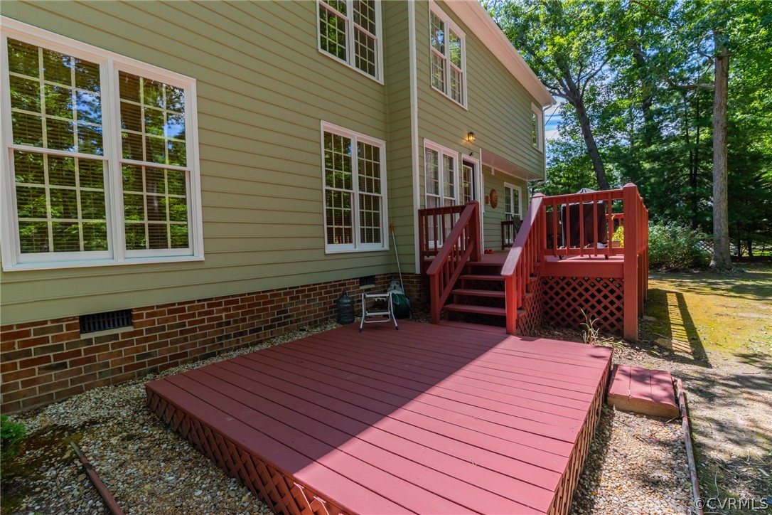 13340 Carters Way Road Chesterfield, VA 23838 - Photo 32 of 44 a view of a wooden deck with a bench