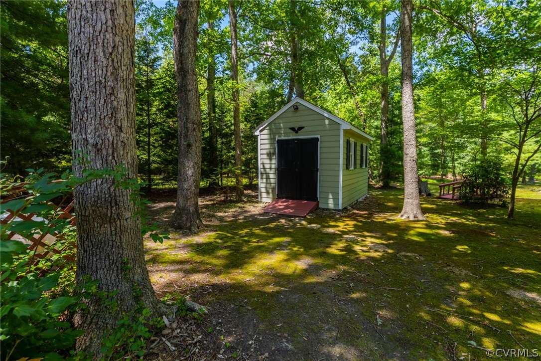 13340 Carters Way Road Chesterfield, VA 23838 - Photo 35 of 44 a front view of a house with yard and trees