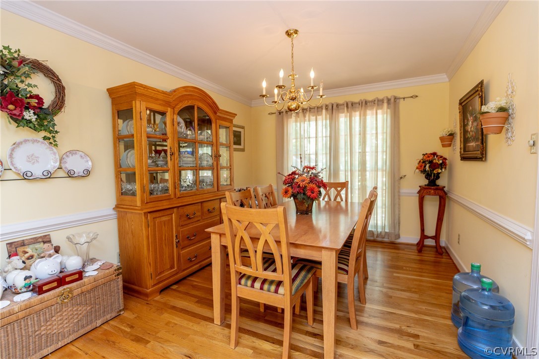 13340 Carters Way Road Chesterfield, VA 23838 - Photo 4 of 44 a view of a dining room with furniture and chandelier