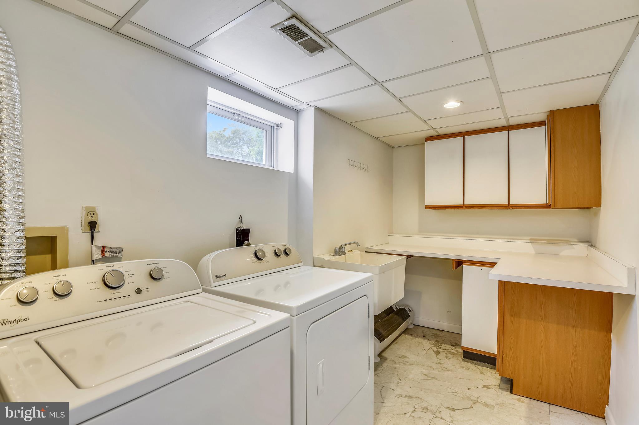 48 Ridge Avenue Edgewater, MD 21037 - Photo 18 of 28 Lower Level Laundry & Storage Area