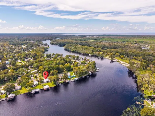 $575,000 | 56310 Redbud Road, Astor, FL 32102