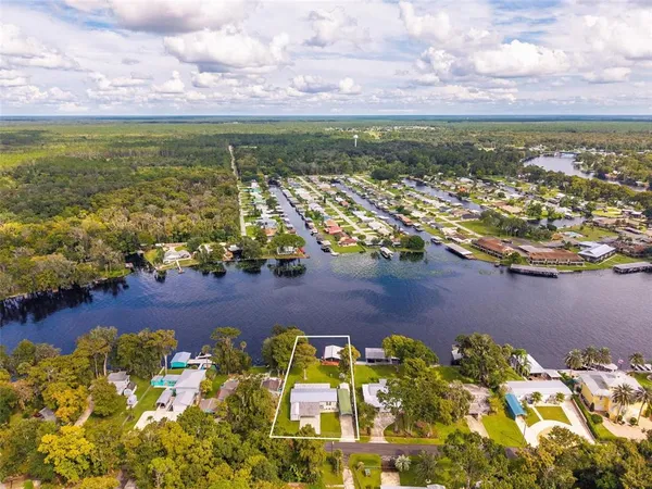 $575,000 | 56310 Redbud Road, Astor, FL 32102