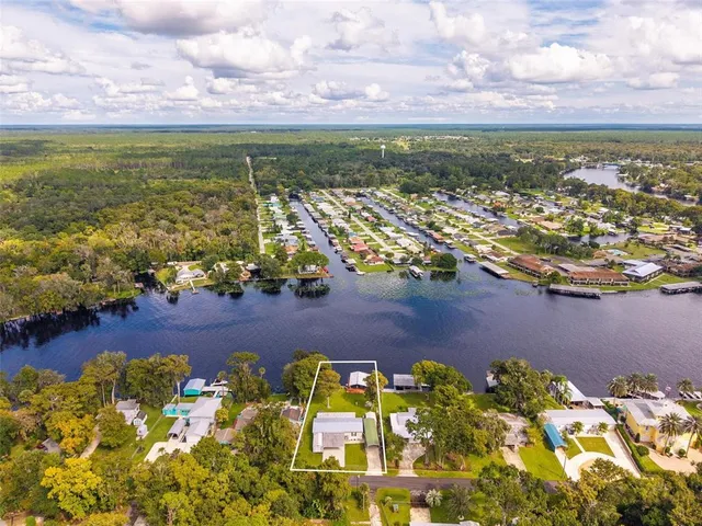 $600,000 | 56310 Redbud Road, Astor, FL 32102