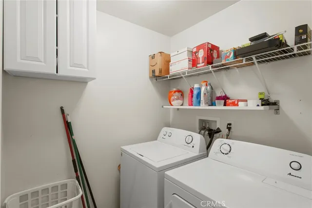 a bathroom with a double vanity sink mirror and double