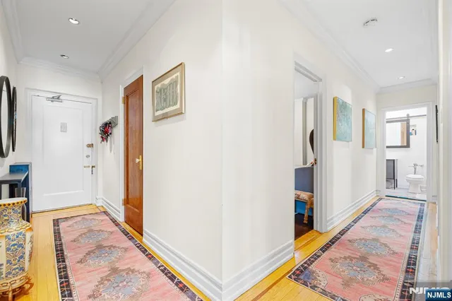 a view of a hallway with front door