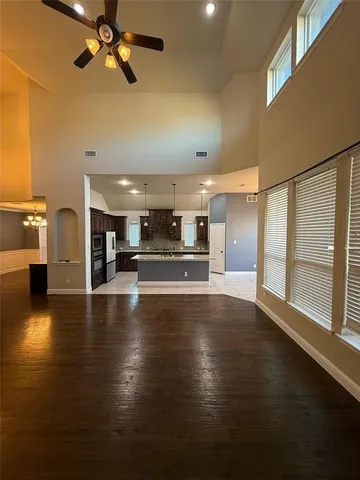 a view of a kitchen with a sink and a stove top oven