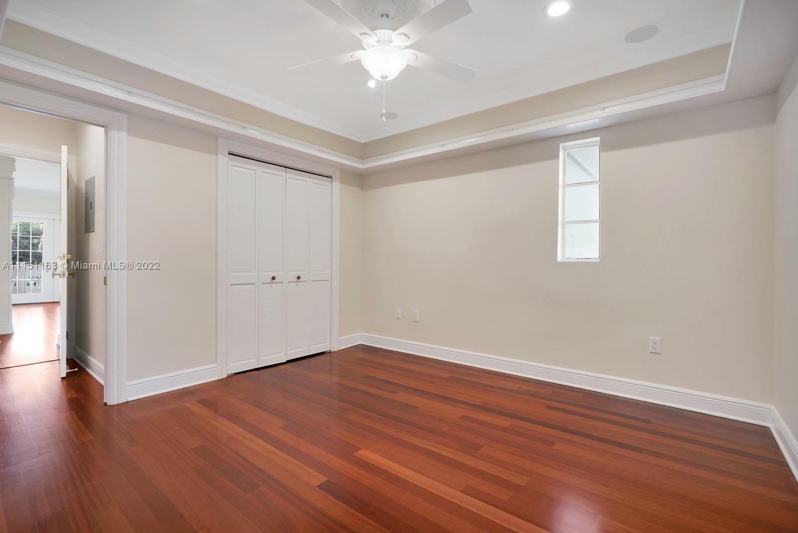 13920 Stirling Road Southwest Ranches, FL 33330 - Photo 49 of 98 wooden floor in an empty room with a window