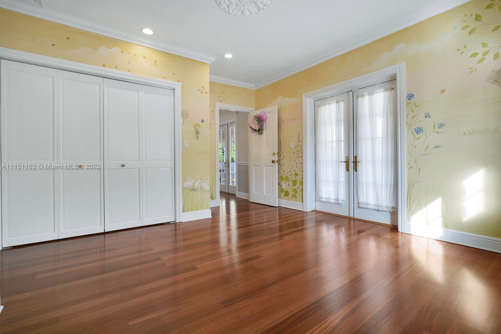 13920 Stirling Road Southwest Ranches, FL 33330 - Photo 68 of 98 a view of an empty room with wooden floor and a window