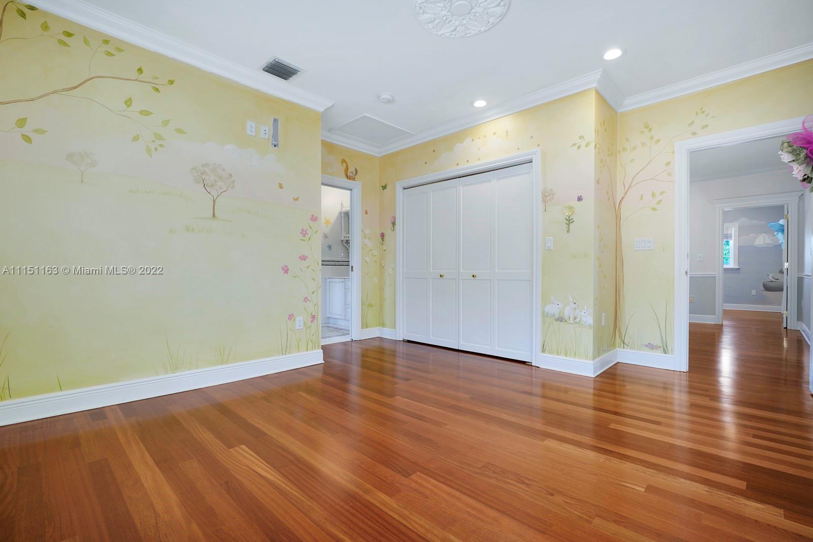 13920 Stirling Road Southwest Ranches, FL 33330 - Photo 69 of 98 a view of a hallway with wooden floor