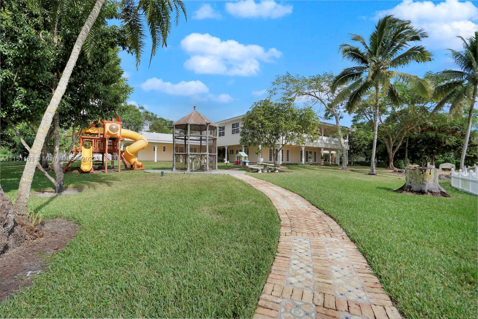 13920 Stirling Road Southwest Ranches, FL 33330 - Photo 76 of 98 a view of a park with palm trees