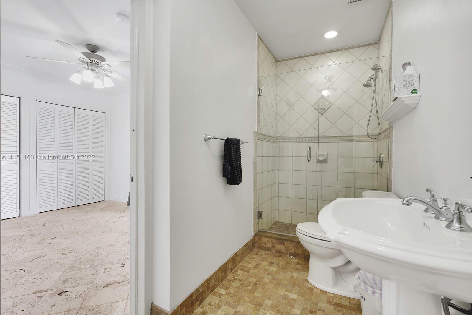 13920 Stirling Road Southwest Ranches, FL 33330 - Photo 84 of 98 a bathroom with a sink toilet and shower