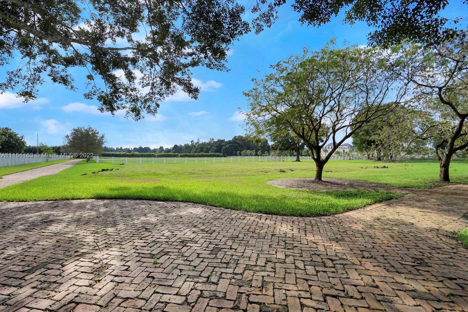 13920 Stirling Road Southwest Ranches, FL 33330 - Photo 98 of 98 a view of a park with large trees