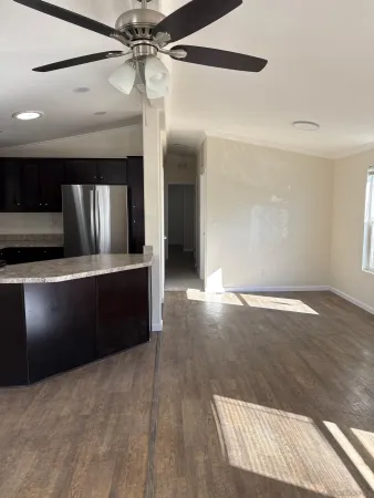 a view of a kitchen with a sink