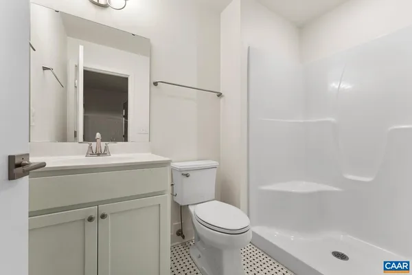 a view of a balcony with wooden floor