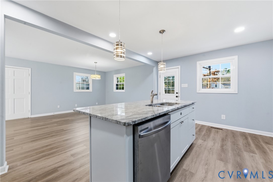 11008 Ryall Road Glen Allen, VA 23059 - Photo 11 of 25 a view of a kitchen counter space and wooden floor