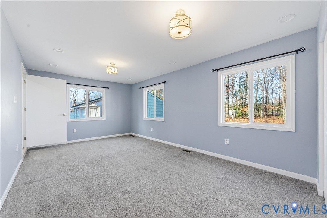11008 Ryall Road Glen Allen, VA 23059 - Photo 14 of 25 an empty room with windows