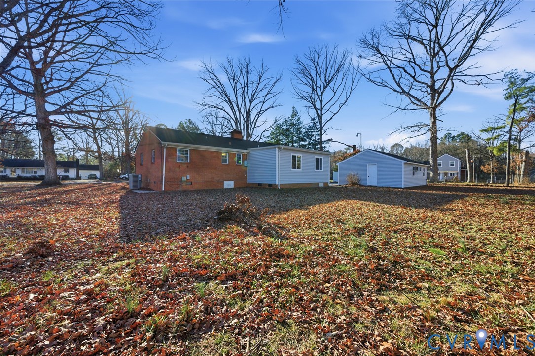 11008 Ryall Road Glen Allen, VA 23059 - Photo 23 of 25 a view of a house with a yard