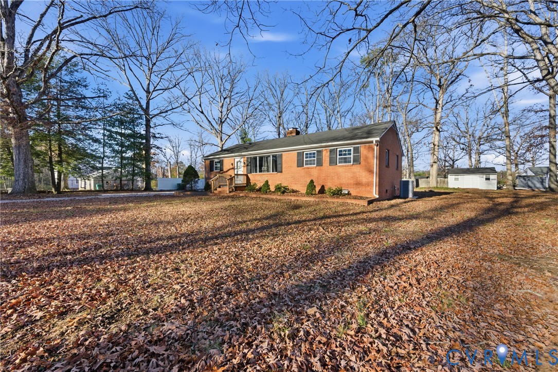 11008 Ryall Road Glen Allen, VA 23059 - Photo 3 of 25 a view of a house with a yard covered with snow