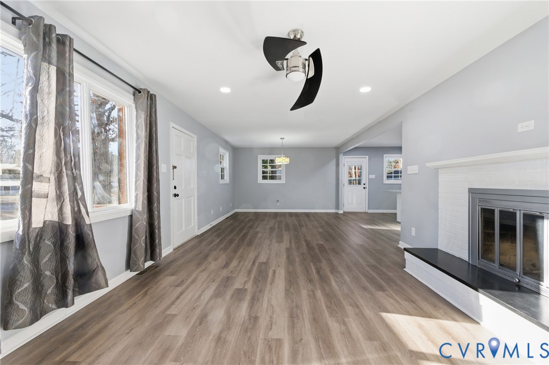 11008 Ryall Road Glen Allen, VA 23059 - Photo 6 of 25 a view of empty room with wooden floor and fan