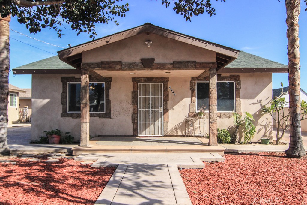 4963 Rose Avenue Riverside, CA 92505 - Photo 1 of 1 a front view of a house with a yard
