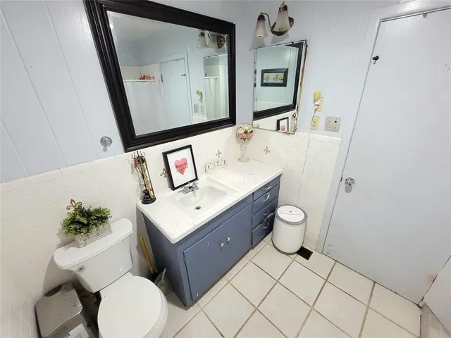 a bed room with furniture and a window