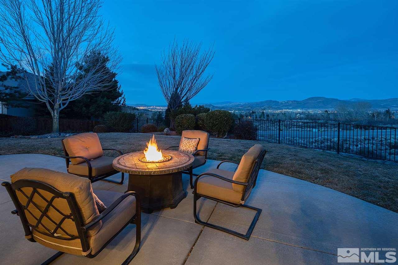 5278 North Elk River Road Reno, NV 89511 - Photo 4 of 30 a outdoor living space with furniture and a fireplace