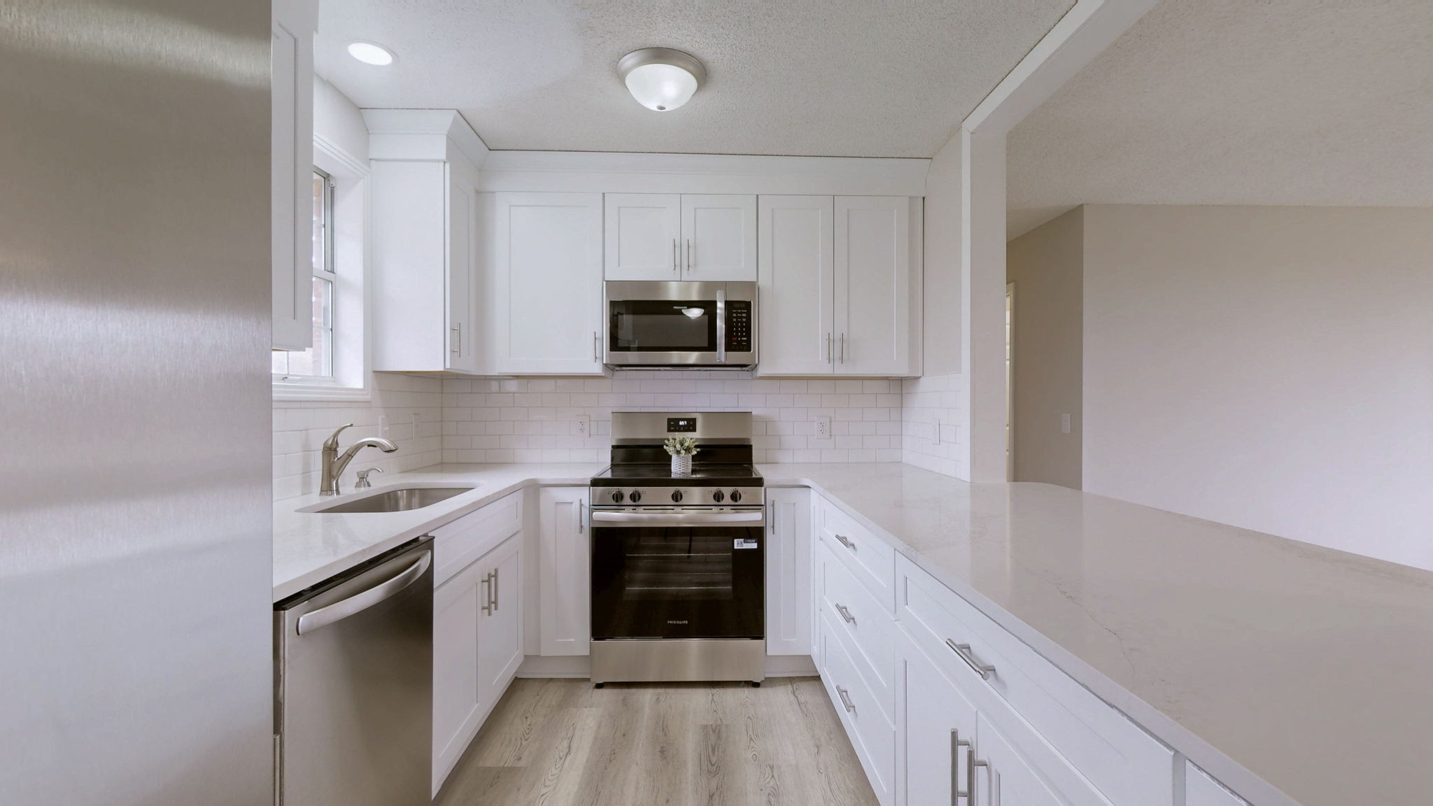 211 Freedom Drive Lebanon, TN 37087 - Photo 14 of 41 a kitchen with a sink stove and microwave