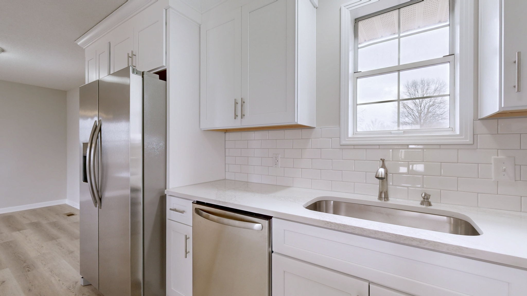 211 Freedom Drive Lebanon, TN 37087 - Photo 16 of 41 a kitchen with stainless steel appliances granite countertop a refrigerator and a sink