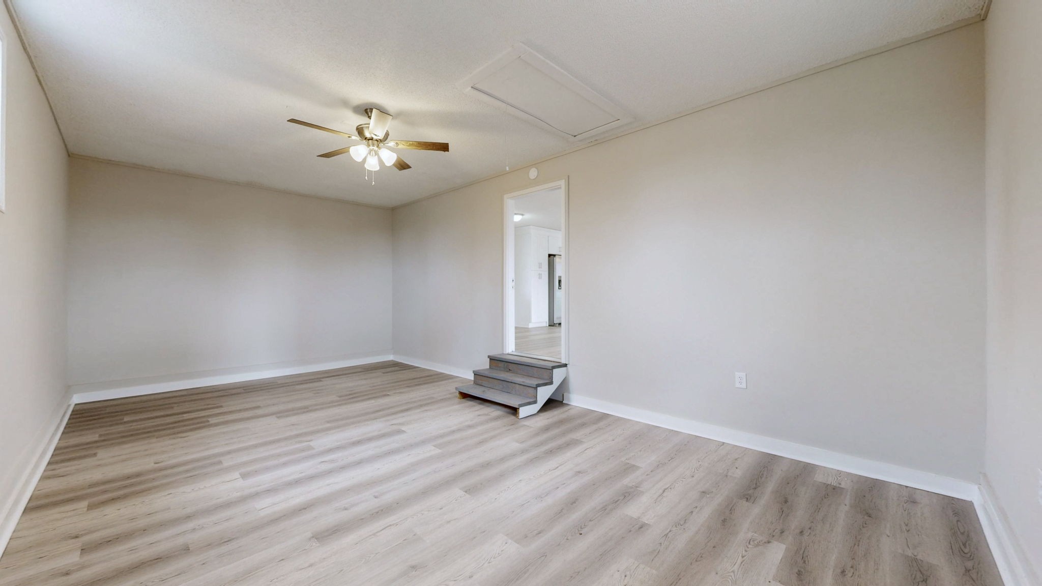 211 Freedom Drive Lebanon, TN 37087 - Photo 29 of 41 wooden floor in an empty room with a window