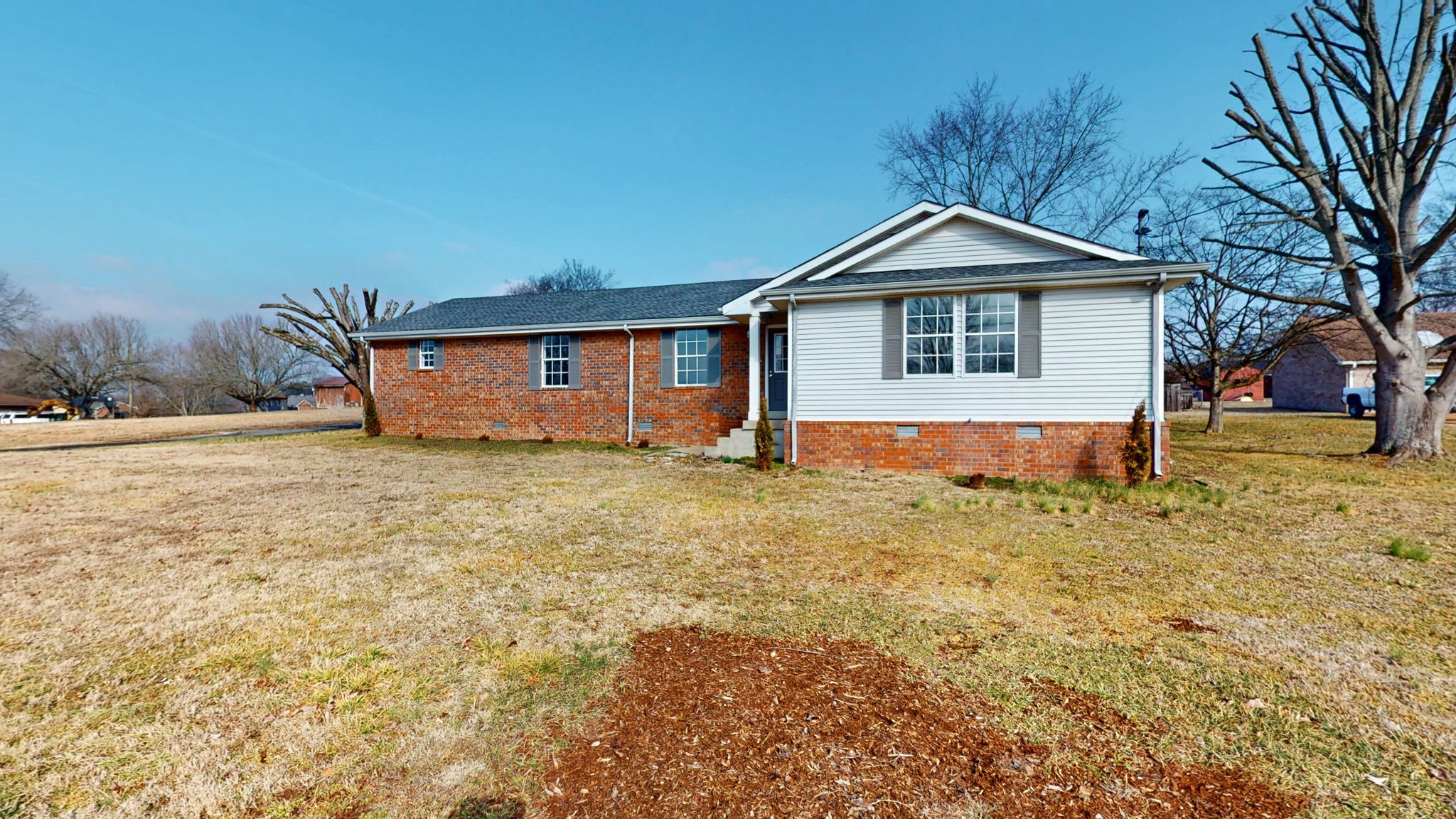 211 Freedom Drive Lebanon, TN 37087 - Photo 4 of 41 a front view of a house with a yard