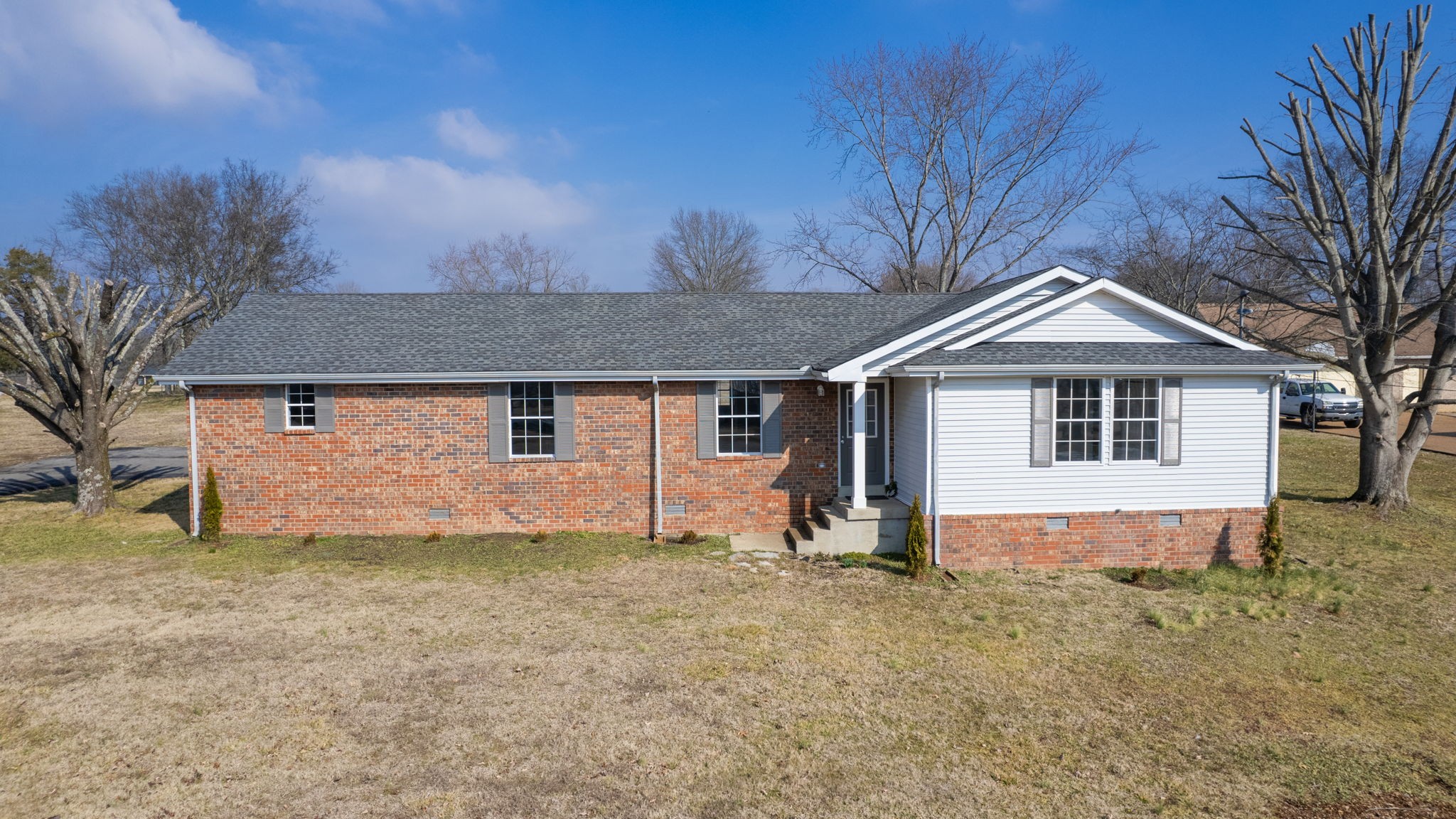 211 Freedom Drive Lebanon, TN 37087 - Photo 6 of 41 a front view of a house with a yard