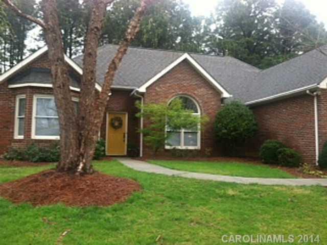428 South Atlantic Drive Fort Mill, SC 29708 - Photo 2 of 16 a front view of a house with garden