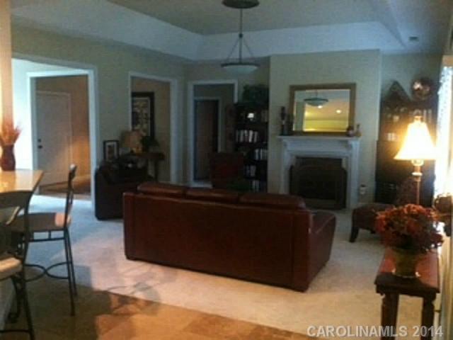 428 South Atlantic Drive Fort Mill, SC 29708 - Photo 6 of 16 a living room with furniture and a flat screen tv