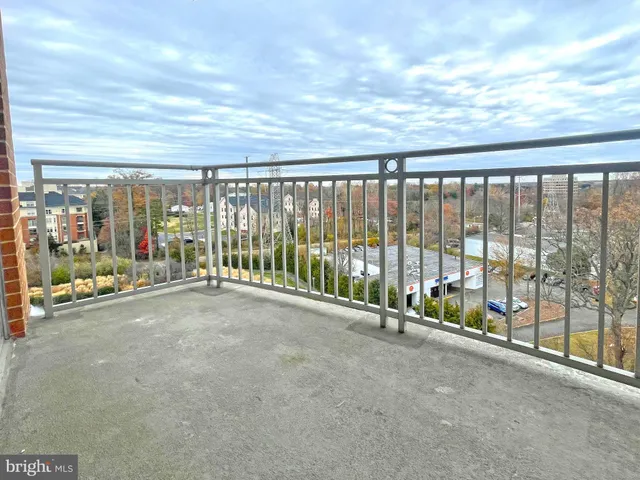 a view of a room with floor to ceiling windows