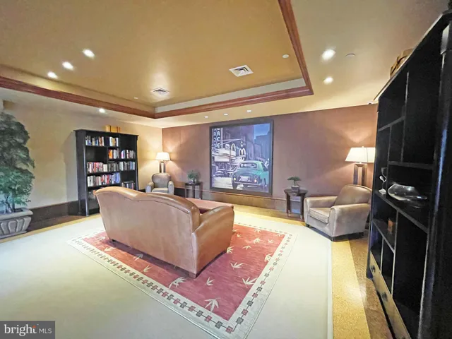 a workspace with wooden floor and a window