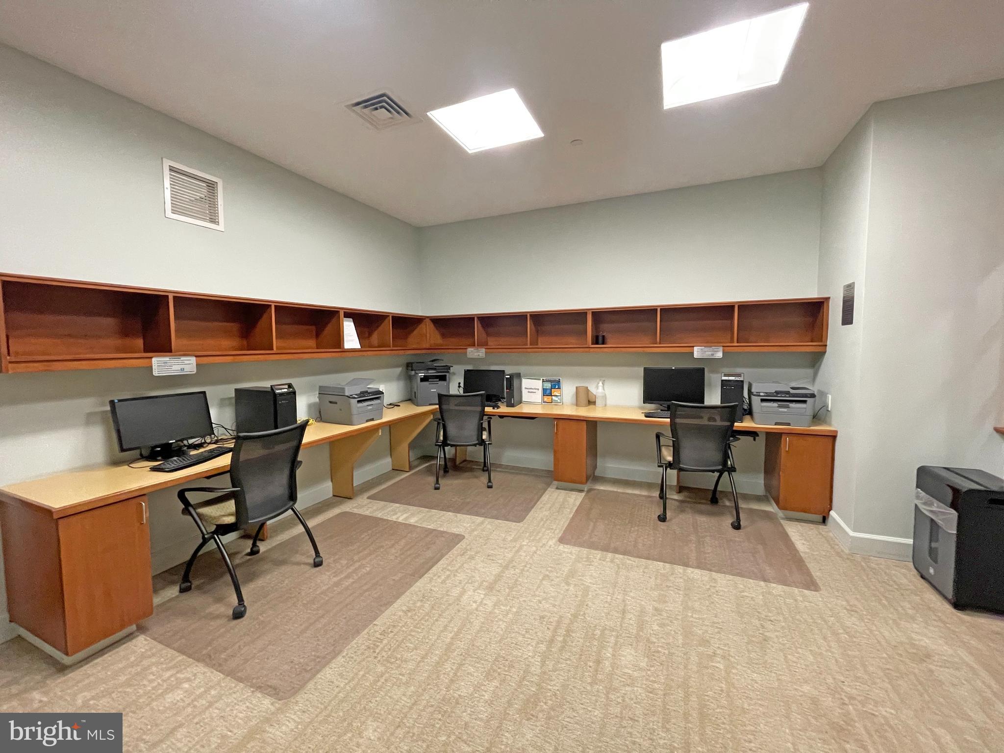 11800 Sunset Hills Road, Unit 722 Reston, VA 20190 - Photo 28 of 41 a workspace with wooden floor and a window