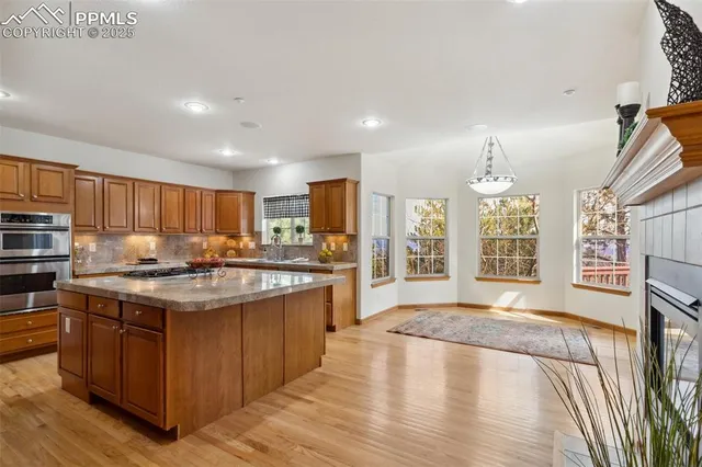 a kitchen with a stove and a sink