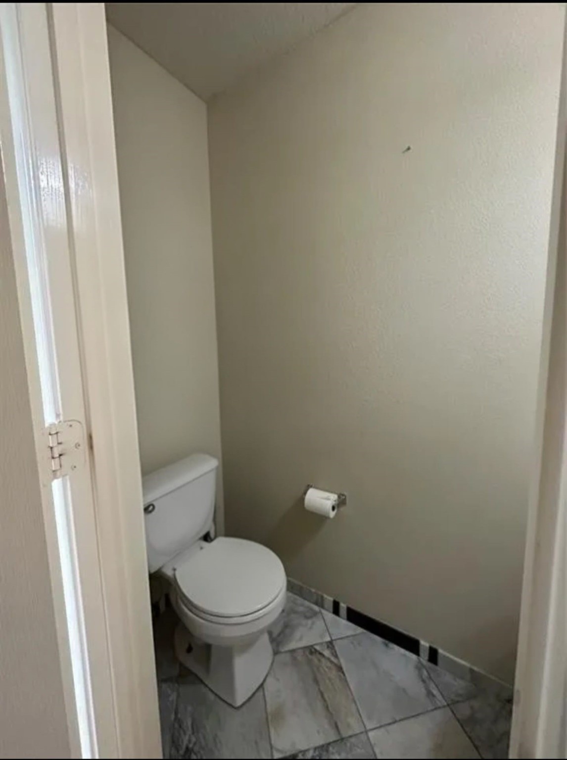 3418 Sapling Oak Drive Houston, TX 77082 - Photo 17 of 22 a white toilet sitting next to a shower