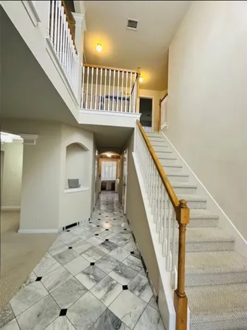 a view of entryway with a front door