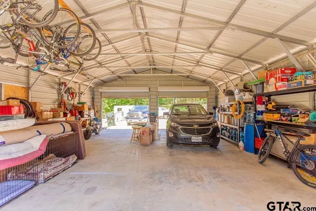 a view of garage with furniture