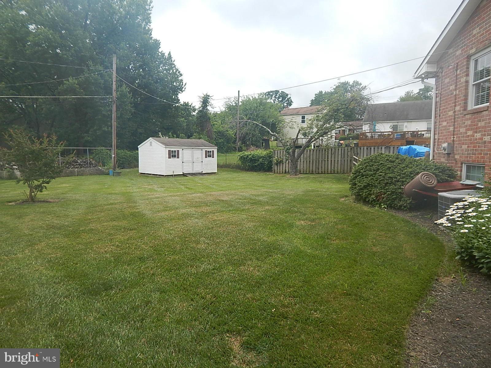 8601 Goldenwood Road Baltimore, MD 21237 - Photo 24 of 27 Large Open Yard with Shed