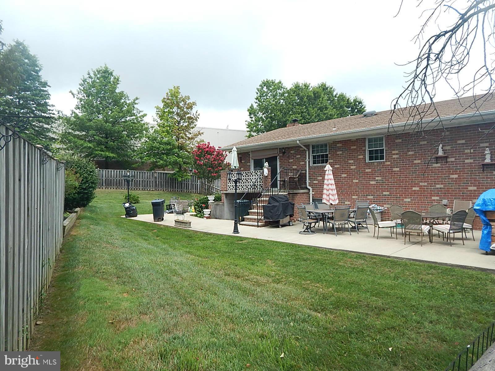 8601 Goldenwood Road Baltimore, MD 21237 - Photo 25 of 27 Huge 'L' Shaped concrete patio