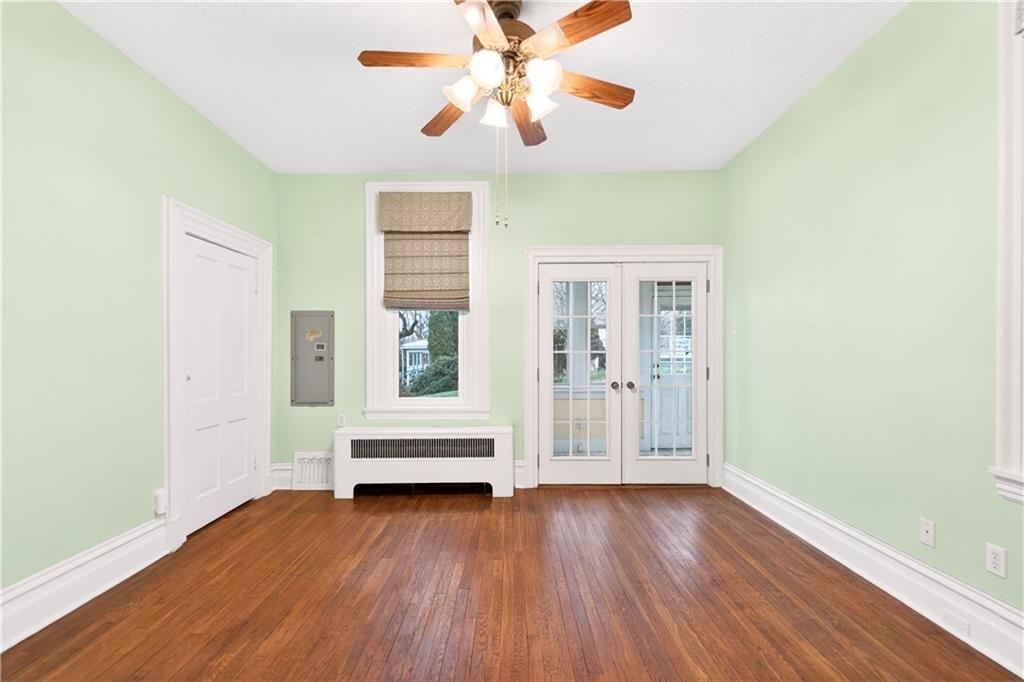136 1/2 Chess Street Monongahela, PA 15063 - Photo 15 of 50 an empty room with wooden floor and windows