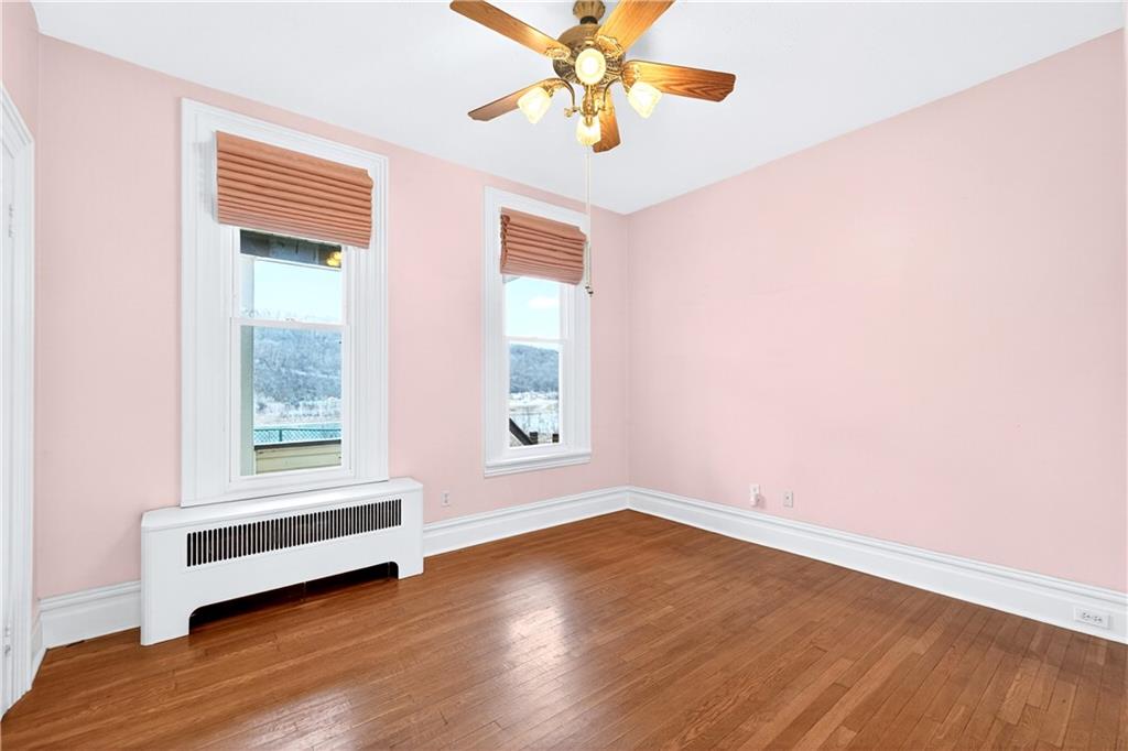 136 1/2 Chess Street Monongahela, PA 15063 - Photo 21 of 50 a view of room with window and ceiling fan
