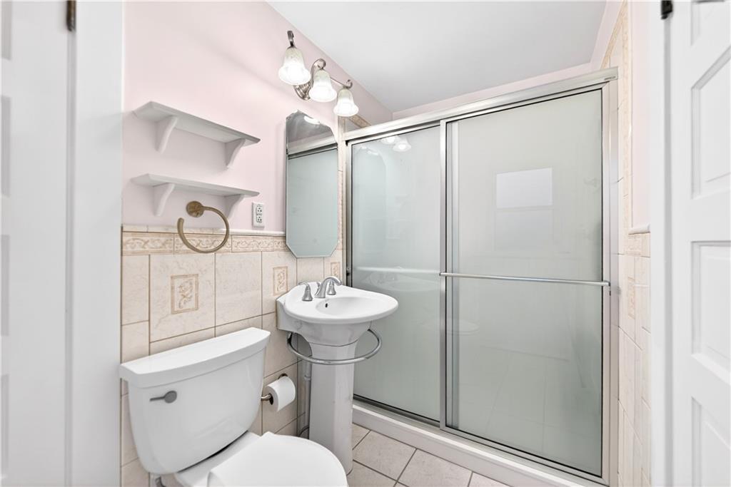 136 1/2 Chess Street Monongahela, PA 15063 - Photo 22 of 50 a bathroom with a sink toilet and shower